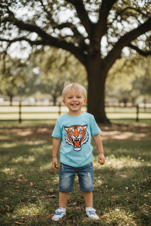 Boy wearing Blue Tiger T-Shirt outdoors